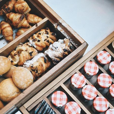 Hotel Telegraaf, Autograph Collection Tallinn Bagian luar foto A selection of Danish pastries