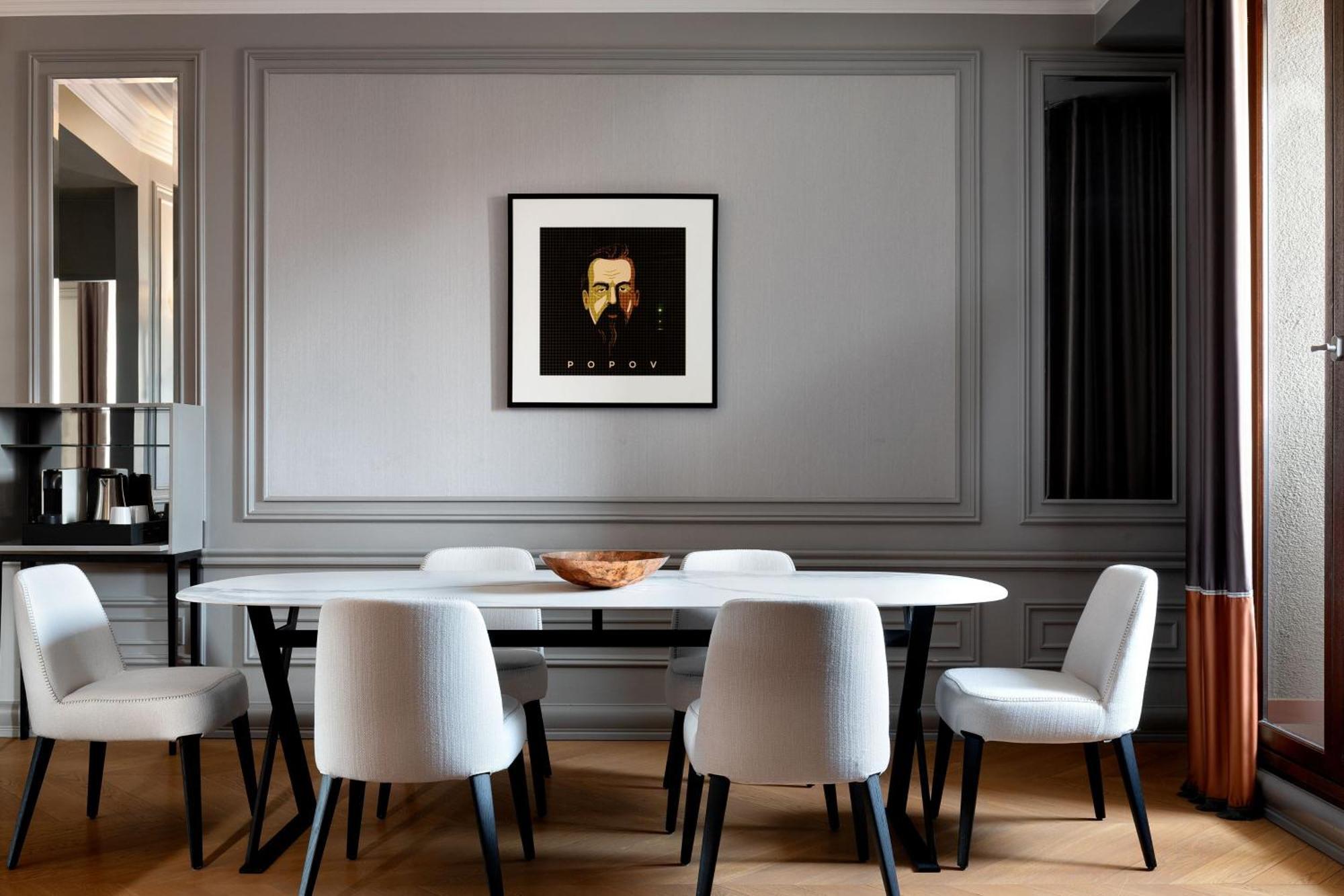 Hotel Telegraaf, Autograph Collection Tallinn Bagian luar foto A dining room with a wall panelling